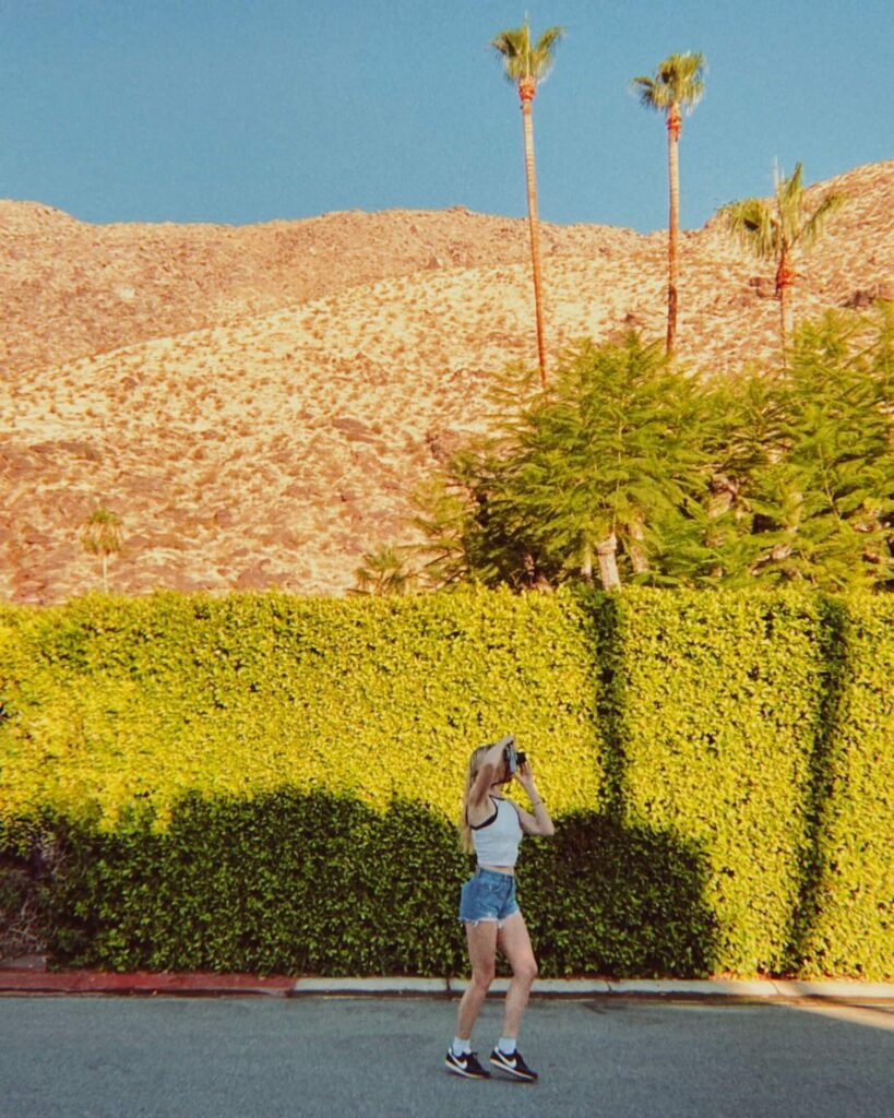 Kate Ferguson taking photos in the Palm Springs neighborhood around Korakia Pensione.