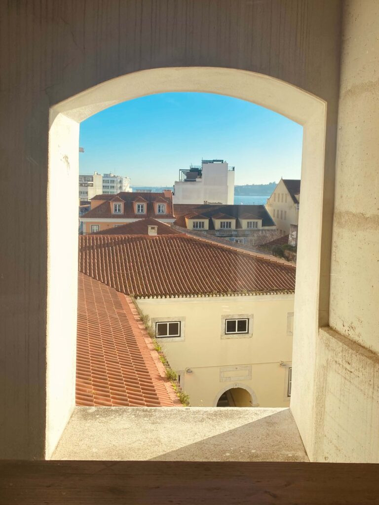 The partial sea view from my hotel room bathroom at Selina Secret Garden Lisbon.